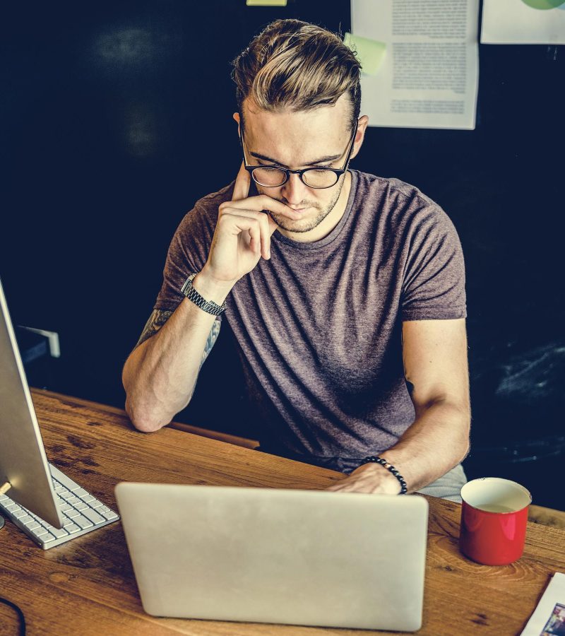 man-busy-photographer-editing-home-office-concept-PWSESWA-1.jpg
